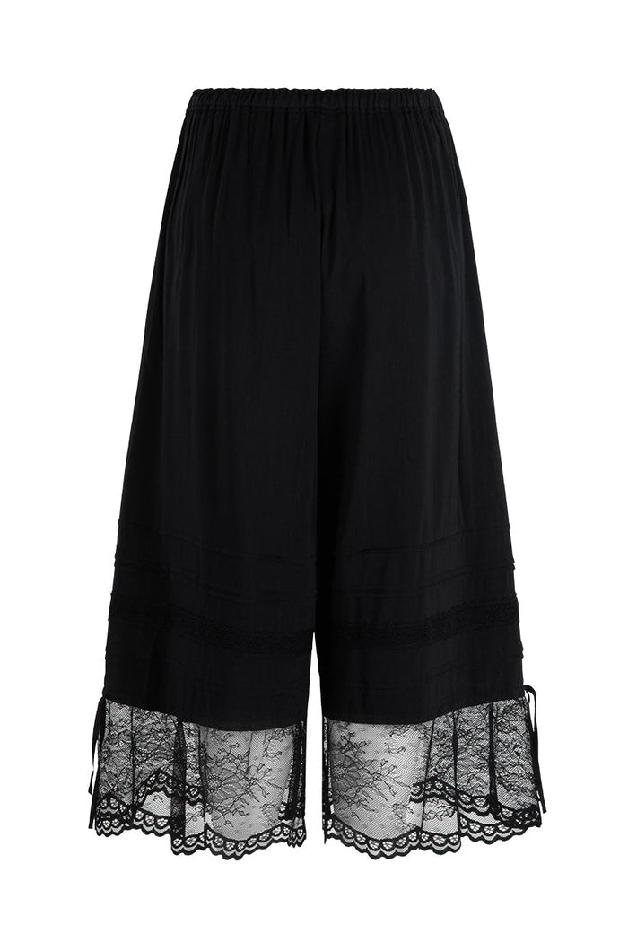 Back flat lay of black wide-leg pantaloon with floral lace hem, self ties, and elastic waist on white background