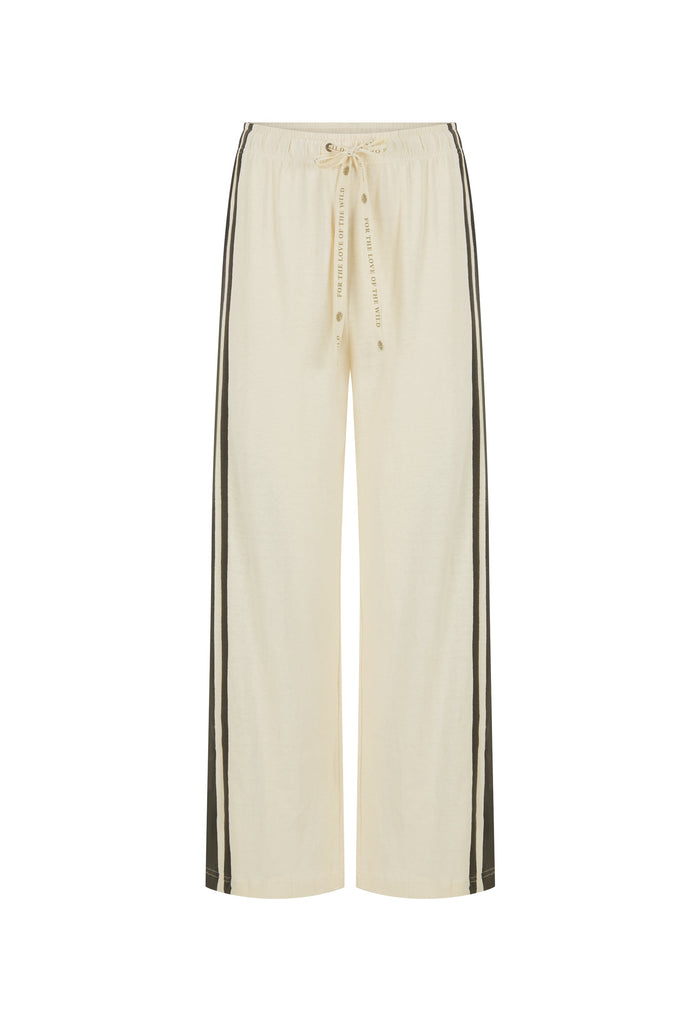 Cream wide-leg pants with black side stripes and a drawstring waist, shown against a plain white background.