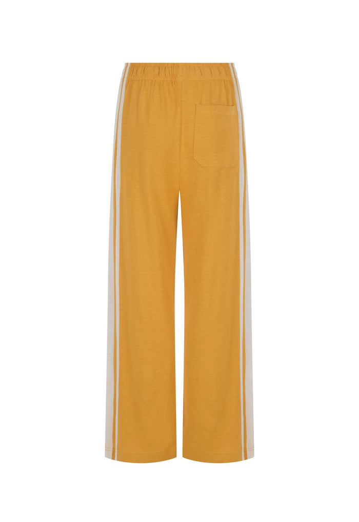 Yellow wide-leg cropped pants with white side stripes and a single front patch pocket, shown against a plain white background.