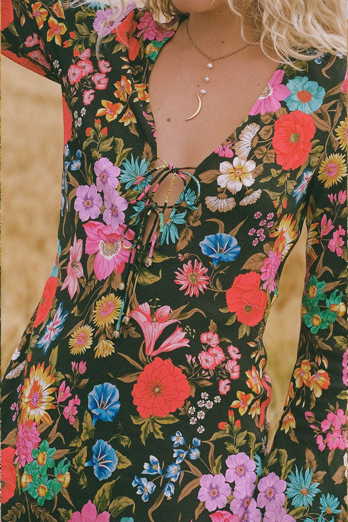Spell women's Valley of the Dolls Bias Mini Dress in Onyx, ECOVERO viscose floral print with front tie detail