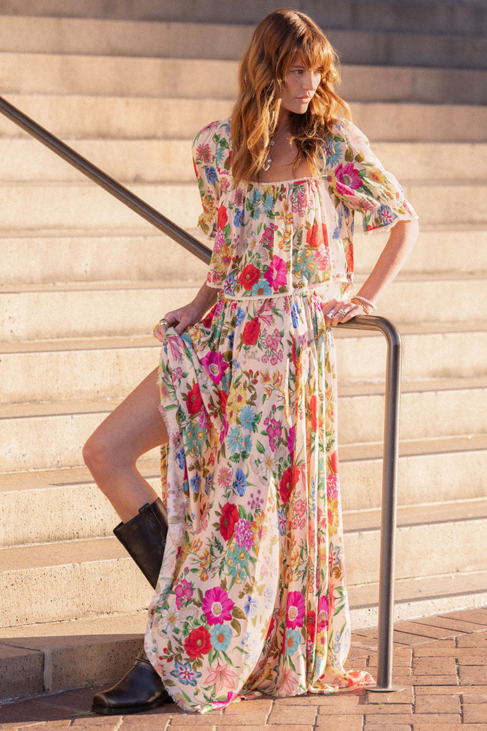 Front view of Valley of the Dolls floral TENCEL maxi skirt showing hi-lo hem and side ties at waist