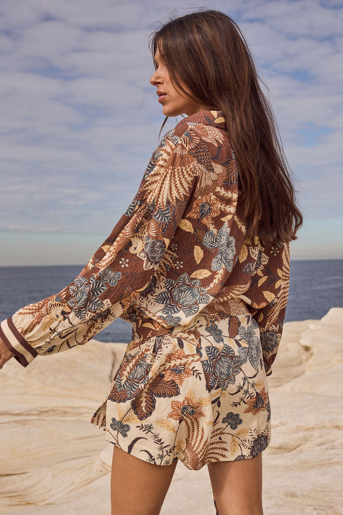 Back view of Volcano Goddess Shirt Dress in Coconut, showing allover floral print and contrast cuffs