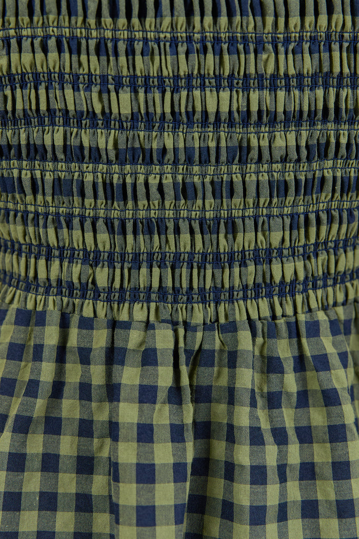 Close-up of green and blue checkered fabric.
